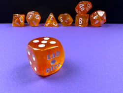 Chessex CHX30052 Borealis Blood orange/white Luminary Polyhedral 7-Dice Set (with bonus die)